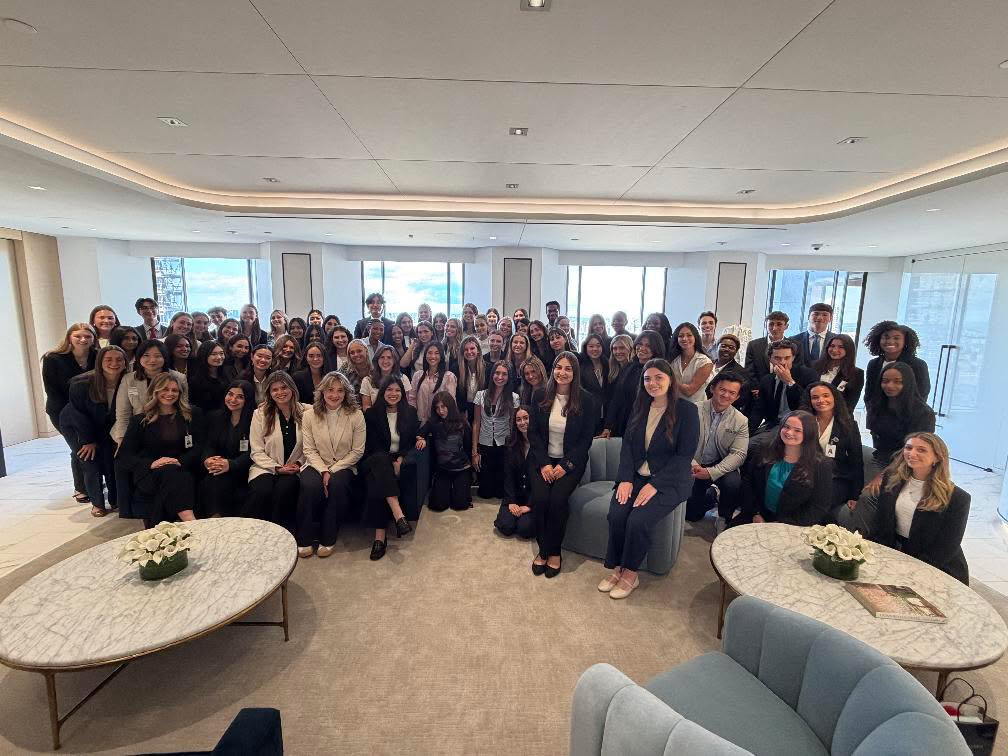 Estée Lauder Companies intern class group photo in a bright office lounge